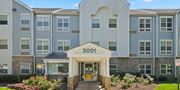 Mount Rainier apartment for rent - The front of a building with the number 3001 on it at Rainier Manor Apartments, Mount Rainier