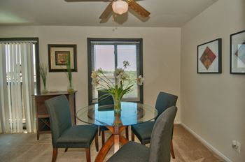 Dining area with table and four chairs
