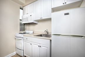 Washington apartment for rent - White Cabinetry And Appliances In Kitchen at Empire, Washington, DC, 20006
