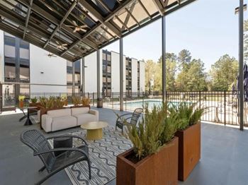 Covered outdoor lounge with seating