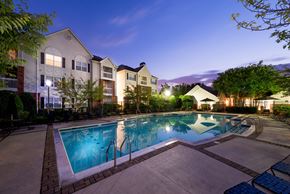 Bowie apartment for rent - resort-style pool at night  at Governors Green, Bowie, MD, 20716