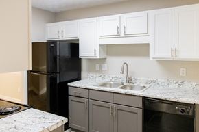 Norcross apartment for rent - Modern kitchen with refrigirator and dishwasher at Twin Springs Apartments, Norcross, GA