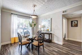 Sandy Springs apartment for rent - a dining room with a table and chairs and a window  at Flats at North Springs, Georgia