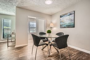 Marietta apartment for rent - A dining room with a table and chairs.