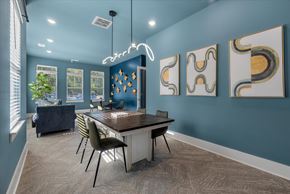 Summerville apartment for rent - A business center with table and chairs.