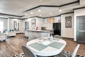 Columbus apartment for rent - A modern dining room with a white table and chairs.
