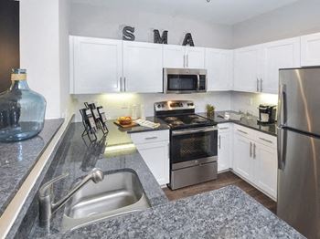 Stainless steel sink with faucet