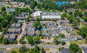 Little Rock apartment for rent - An aerial view of a residential area with a pool, clubhouse, and a grill & picnic area.