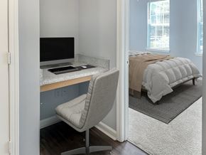 Decatur apartment for rent - a bedroom with a bed and a desk with a computer