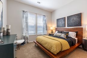Charlotte apartment for rent - our apartments offer a bedroom with a king sized bed at Century University City, Charlotte, NC