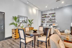 Doraville apartment for rent - a dining room with a table and chairs and a kitchen