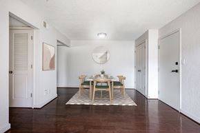 Kansas City apartment for rent - A dining room with a table set for two.