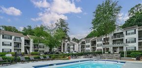 Atlanta apartment for rent - A swimming pool in front of apartment buildings.