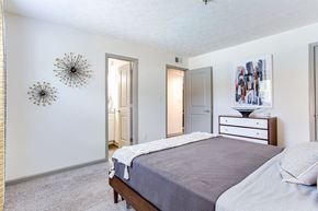 Decatur apartment for rent - a bedroom with a bed and a dresser