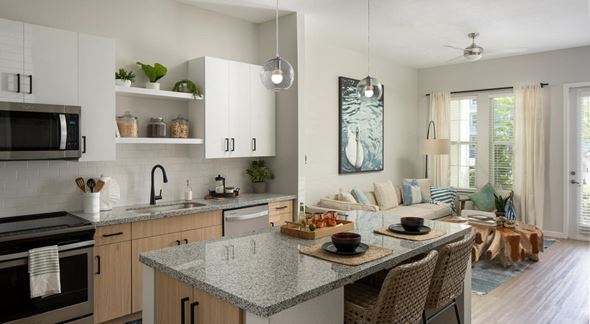 Clearwater apartment for rent - A modern kitchen with a dining table set for two.