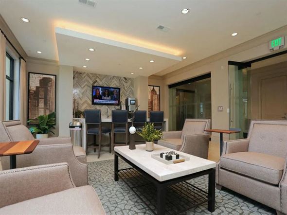 Duluth apartment for rent - Spacious clubroom with seating and tv 2370 Main at Sugarloaf Duluth, GA