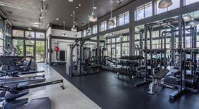 Columbus apartment for rent - A gym with a variety of equipment including treadmills, weights, and exercise machines.