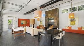 Columbus apartment for rent - A modern kitchen with a dining table and chairs.