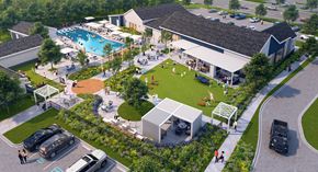 Huntsville apartment for rent - A large outdoor recreational area with a swimming pool, playground, and picnic tables.