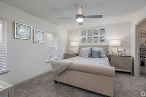 Villa Rica apartment for rent - A bedroom with a bed, nightstands, and pictures on the wall.