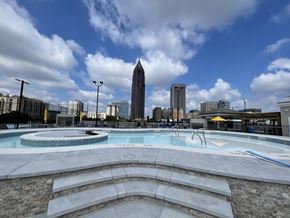 Atlanta apartment for rent - a pool with a city skyline in the background