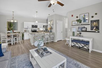 Summerville apartment for rent - A living room with a grey coffee table and a white sofa.