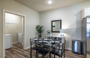Lexington apartment for rent - A dining room with a glass table and chairs.