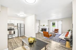 Shawnee Mission apartment for rent - A modern kitchen with a dining table and chairs.