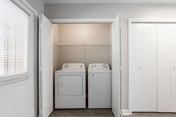Full size washer and dryer in dedicated alcove