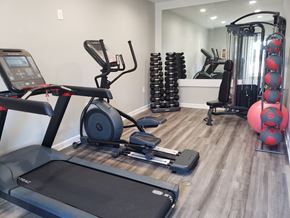 East Ridge apartment for rent - a gym with cardio equipment and weights at Summit East Ridge, Tennessee, 37412