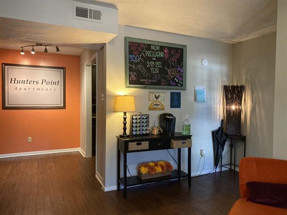 College Station apartment for rent - a living room with a table and a chalkboard on the wall