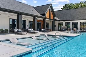 Arden apartment for rent - A large indoor swimming pool with a diving board.