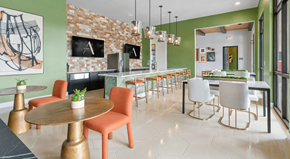 Arden apartment for rent - A modern dining room with a round table and chairs.