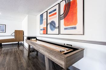 A pool table with a billiard set on it