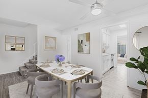 Savannah apartment for rent - A dining room with a table set for a meal.