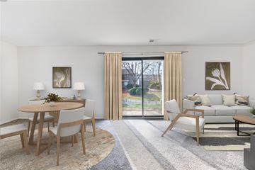 Prairie Village apartment for rent - A modern living room with a dining table and chairs.