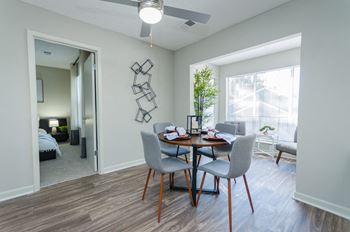 Our apartments offer a dining room and living room with a large window