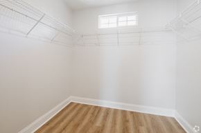 Moncks Corner apartment for rent - Empty room with a window and wooden floor.