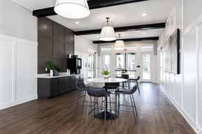 Orlando apartment for rent - a dining room and kitchen with a table and chairs