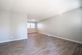 Columbus apartment for rent - an empty living room with white walls and wood floors