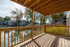 Indianapolis apartment for rent - a deck with a view of a body of water