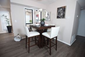 Hoover apartment for rent - A dining room with a wooden table and chairs at Ridge Crossings Apartments, Hoover