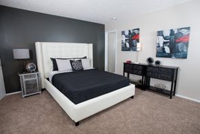 Hoover apartment for rent - A bedroom with a large bed and two nightstands at Ridge Crossings Apartments, Alabama 35244