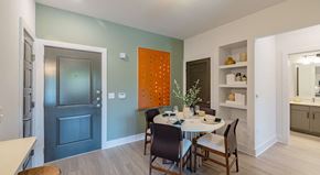 Frisco apartment for rent - A dining room with a table set for two.