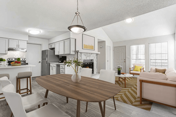 Newnan apartment for rent - A modern kitchen with a dining table and chairs.