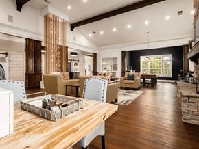 Columbus apartment for rent - A dining room with a wooden table and chairs.