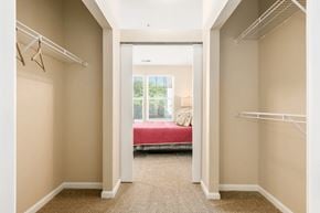Columbus apartment for rent - A bedroom with a bed and a window.