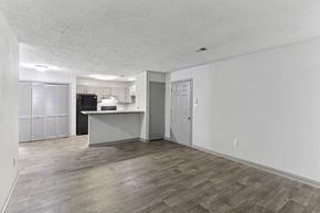 Smyrna apartment for rent - A room with a kitchenette and a door.