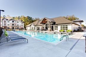 Augusta apartment for rent - our apartments have a resort style pool with lounge chairs at The Laney, Augusta