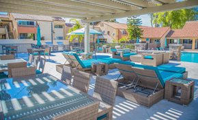 San Diego apartment for rent - a patio with tables and chairs and a swimming pool